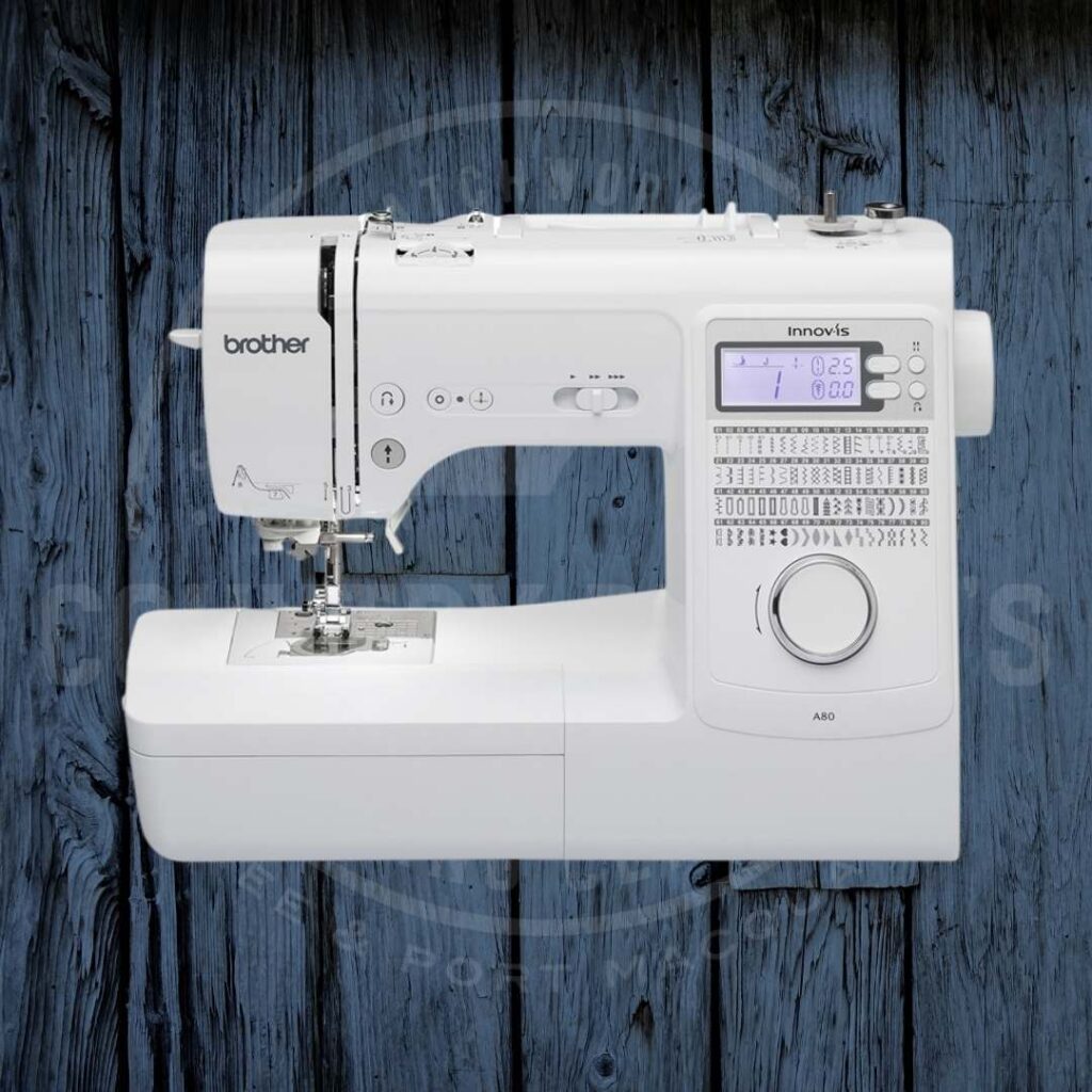 white sewing machine with a small LCD screen and dial.